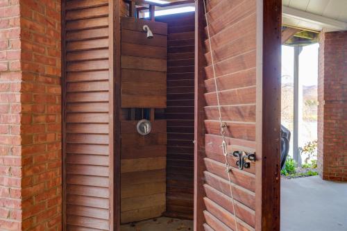 a wooden wall with a door in a building at Lake Chatuge Apt with Boat Dock in Hayesville! in Hayesville