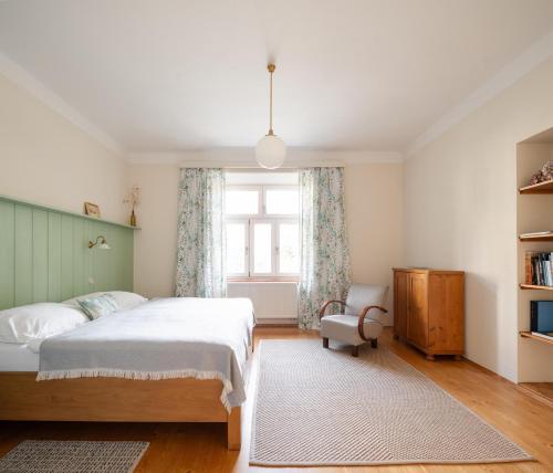 Postel nebo postele na pokoji v ubytování Vila NMNM