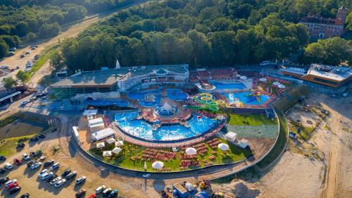an aerial view of a large water park at Dom Pracy Twórczej in Uniejow