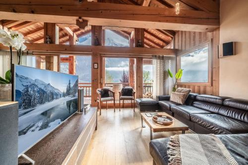 Televisyen dan/atau pusat hiburan di Chalet Ibex Les Houches Chamonix - by EMERALD STAY