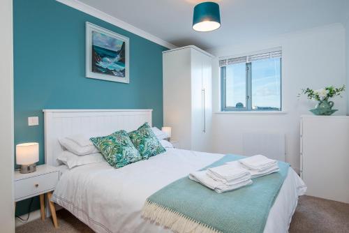 Ένα ή περισσότερα κρεβάτια σε δωμάτιο στο Shearwater