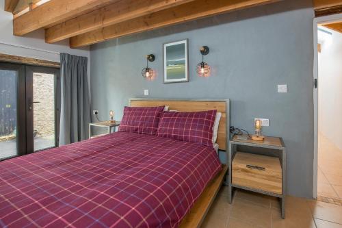 Voodi või voodid majutusasutuse The Stables And Bullpen toas