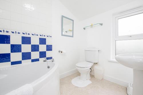 Et badeværelse på Amroth Cottage