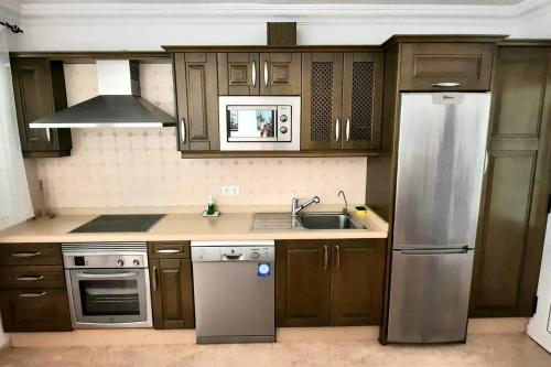 A kitchen or kitchenette at famara surf wifi 2