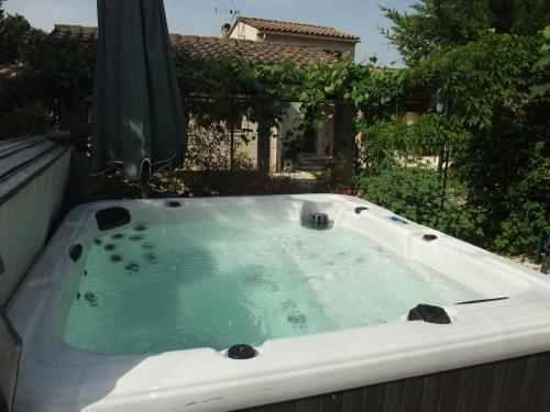a jacuzziificialificialificialificialificialificialificialificialificialificialificial at Gite La Paillote in Montauroux