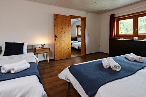 Postel nebo postele na pokoji v ubytování Spago am Hochkönig