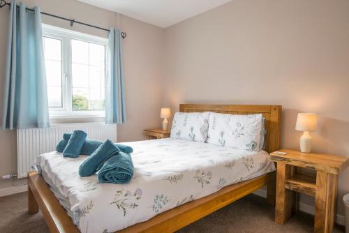 Giường trong phòng chung tại Hiraeth