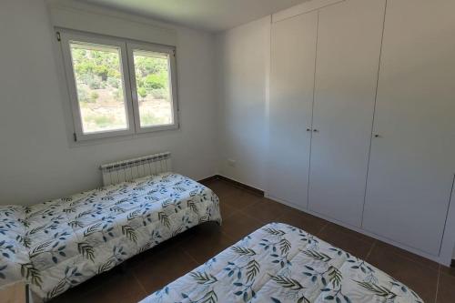 Ένα ή περισσότερα κρεβάτια σε δωμάτιο στο Casa Bruno