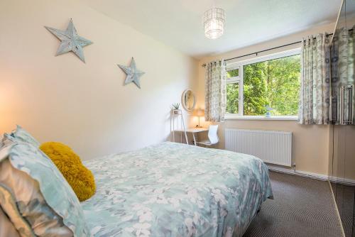 Giường trong phòng chung tại 1 Homecroft Bungalows