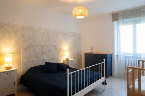 Ένα ή περισσότερα κρεβάτια σε δωμάτιο στο Casletto Vacanze