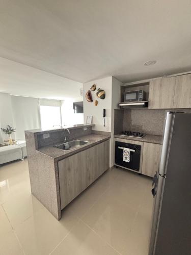Kuchyň nebo kuchyňský kout v ubytování Apartamento de playa Ocean Drive