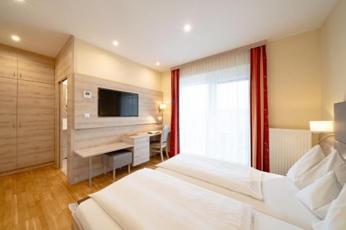 Ένα ή περισσότερα κρεβάτια σε δωμάτιο στο SCHACHENWALD Hotel & Restaurant I Free Parking