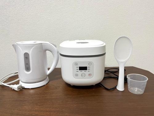 Guest House Happy Highness DAZAIFUにあるコーヒーまたはお茶