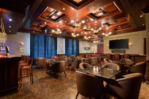 TV a/nebo společenská místnost v ubytování Radisson Blu Hotel, Muscat