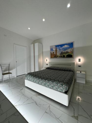 Postel nebo postele na pokoji v ubytování B&B Rossini Luxury 3