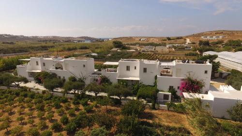 an aerial view of a villa with white houses at Marili Apartments Studios in Parasporos