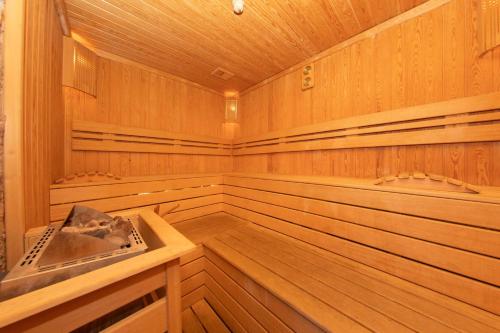 a large wooden sauna with a sink in it at Radisson Blu Ankara in Ankara