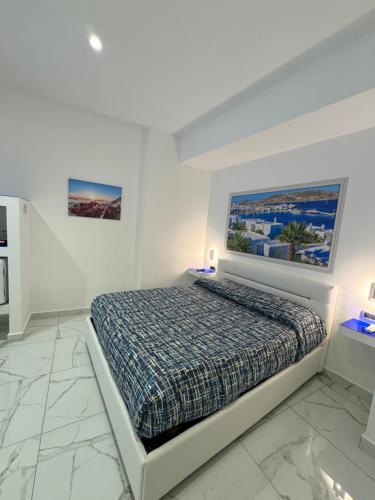 Postel nebo postele na pokoji v ubytování B&B Rossini Luxury 3