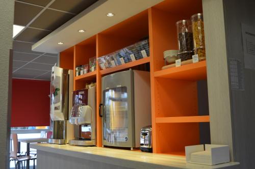 Coffee and tea making facilities at Premiere Classe Strasbourg Ouest