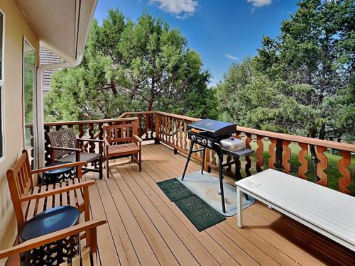 a grill on the deck of a house at Tanglewood in Ruidoso