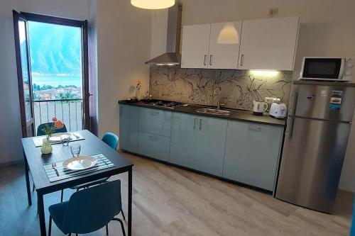 Kuchyň nebo kuchyňský kout v ubytování Casa Azzurra