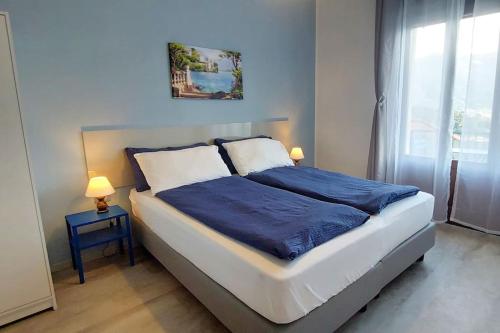 Postel nebo postele na pokoji v ubytování Casa Azzurra