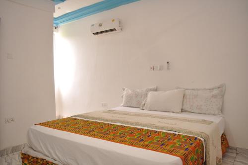 Cama o camas de una habitación en BB Tributary Hotel