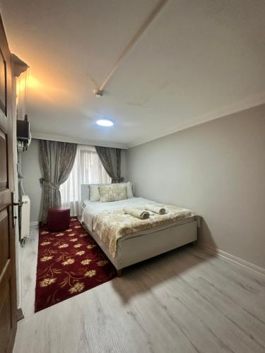 A bed or beds in a room at Amore Hotel Istanbul