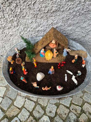 a model of a small house in the dirt at Bed & Breakfast Casa Marinella in Lenna