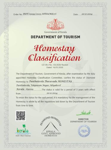 a white document with a certificate ofavascript emergencyclassification at Traditional Kerala Home in Kollam