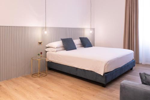 Postel nebo postele na pokoji v ubytování Tiburtina 86 Luxury Suites