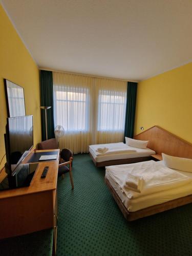 Postel nebo postele na pokoji v ubytování Hotel A2