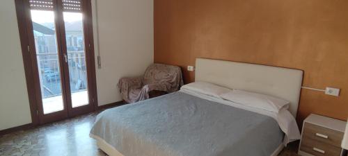 Letto o letti in una camera di The Caponi Bros