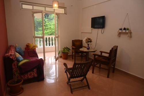 Et tv og/eller underholdning på Charlotte Homes by Nosso Amor