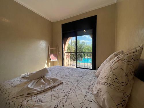 Katil atau katil-katil dalam bilik di La Perle de Marrakech by Atlas Golf Resort