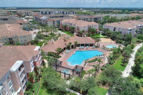 an aerial view of an apartment complex with a swimming pool at Vista Cay Resort, Next To Universal #821 in Orlando