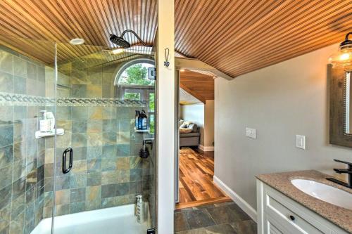 a bathroom with a shower and a sink at Lake Front Enfield Home with Deck & Boat Dock! in Enfield