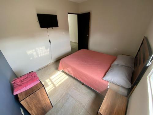 Ένα ή περισσότερα κρεβάτια σε δωμάτιο στο Departamento Piso 2