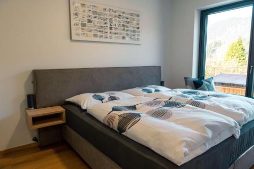 Ένα ή περισσότερα κρεβάτια σε δωμάτιο στο Appartement Herzmoar