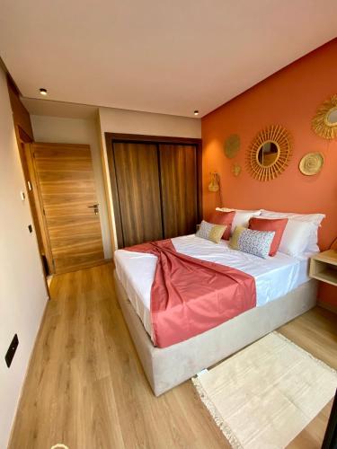 Postel nebo postele na pokoji v ubytování Confort & Charme à Casablanca