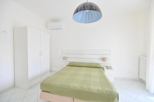 Letto o letti in una camera di Residence San Domenico