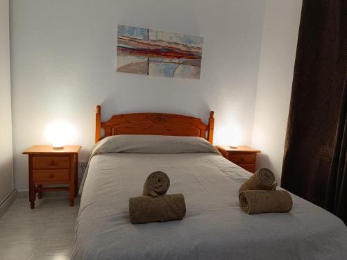 Postel nebo postele na pokoji v ubytování Vera Natura Apartamento Maria