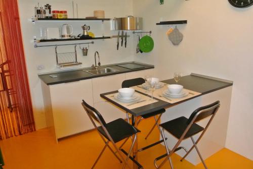 A kitchen or kitchenette at Duomo House