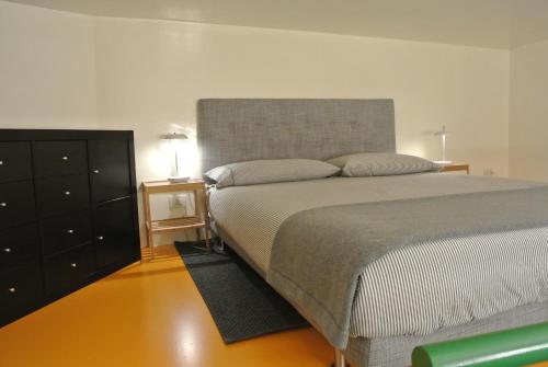 A bed or beds in a room at Duomo House