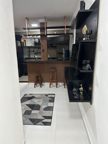 Kuchyň nebo kuchyňský kout v ubytování Loft completo com area de lazer piscina e churrsqueira