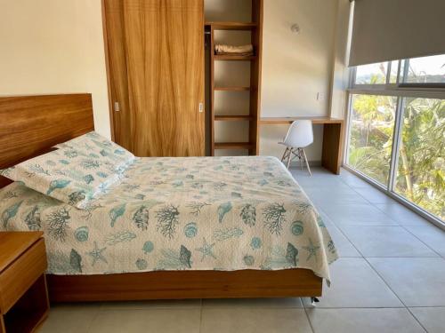 Una cama o camas en una habitación de Aqua Reef Condos Sayulita Apt 3