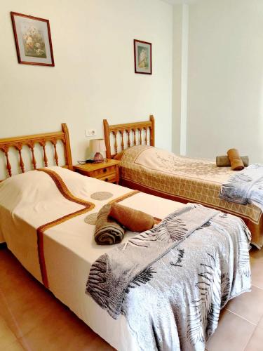Katil atau katil-katil dalam bilik di Piso La Rapita muy centrico 4 camas 3 dormitorios