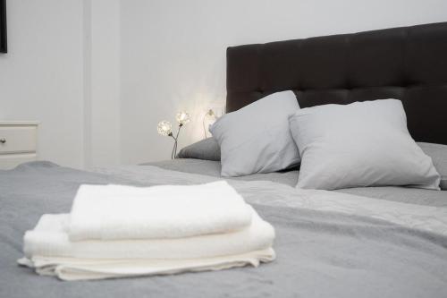 Ένα ή περισσότερα κρεβάτια σε δωμάτιο στο Apartamento ateneo
