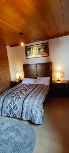 Katil atau katil-katil dalam bilik di Finca G fiestas eventos descanso
