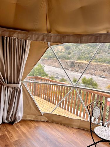 a view of a balcony from a tent at Altos de Guayacan 1 in San José de Maipo